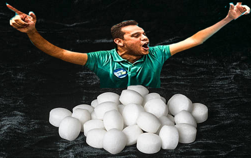 White naphthalene balls on black velvet