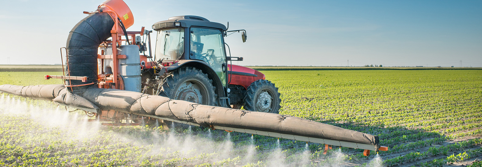 tractor spraying pesticides