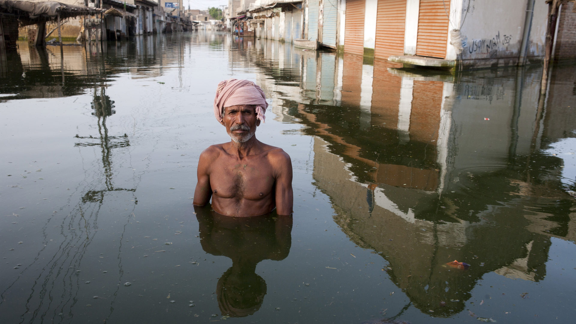 Pakistan - Floods - Portrait in floodwaters